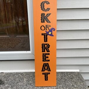 Greet neighbors and guests this Halloween season with a Trick or Treat porch sign.