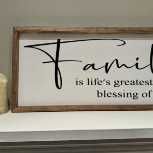 Family sign over fireplace. Family is life's greatest blessing of all