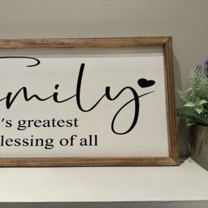 Family wooden decorative indoor sign with trim.