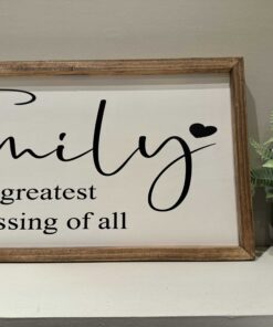 Family wooden decorative indoor sign with trim.