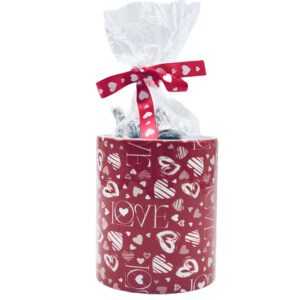 Custom Love Mug covered with hearts, candy kisses packaged with a heart bow. Option to add a custom message.