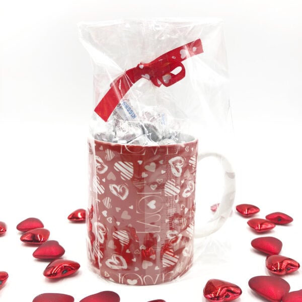 Love Mug with candy kisses. Gift wrapped with custom message from sender.