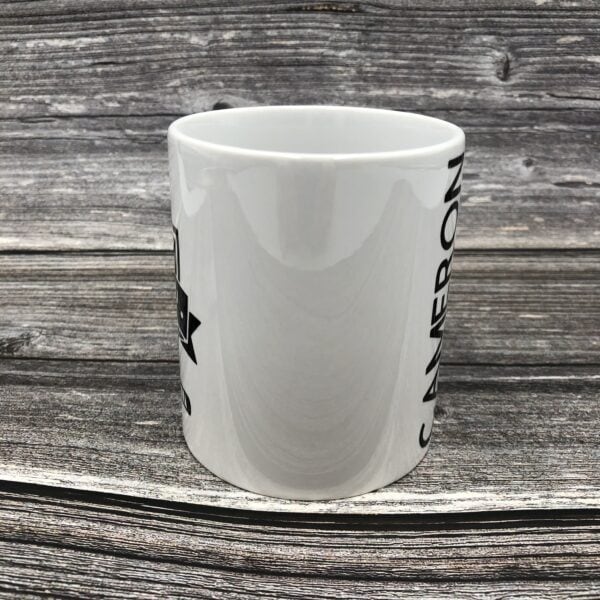 Hockey coffee mug with personalized name on back of mug. Black design white ceramic.