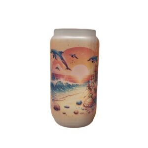 Beach tumbler, 16 oz. frosted glass shaped like beer can. Beach scene on back in orange and blue.