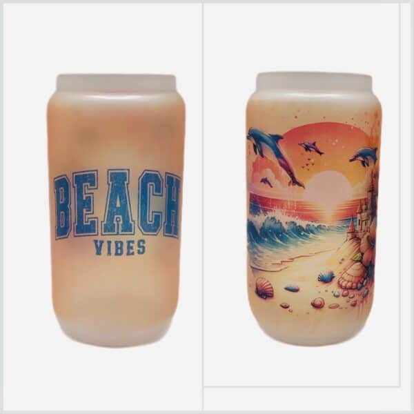 Beach tumbler, 16 oz. frosted glass shaped like beer can. Beach Vibes on front and beach scene on back in orange and blue.