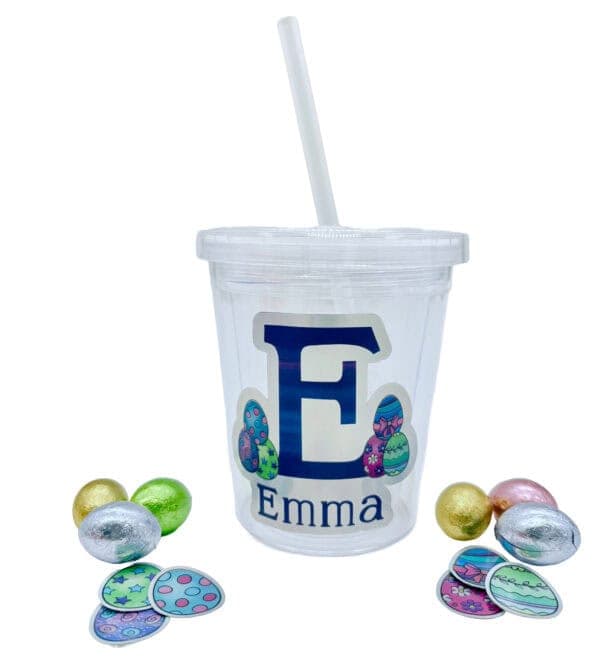 Personalized Easter Tumbler with Stickers and Chocolate Eggs.